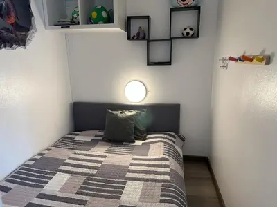 Ein Bett oder Betten in einem Zimmer der Unterkunft Apartment Ferienapartm- Adler by Interhome