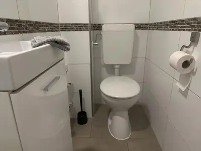 Ein Badezimmer in der Unterkunft Apartment Ferienapartm- Adler by Interhome