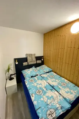 Ein Bett oder Betten in einem Zimmer der Unterkunft Apartment Feriendomizil Adler by Interhome
