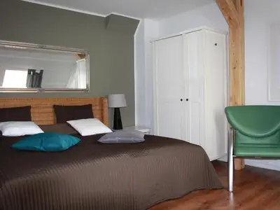 Ein Bett oder Betten in einem Zimmer der Unterkunft Apartment Gemütliche Wohnung in Wernigerode mit Garten und Grill by Interhome