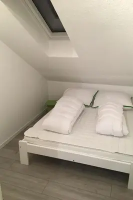 Ein Bett oder Betten in einem Zimmer der Unterkunft Apartment Moderne Ferienwohnung Mila in Braunlage by Interhome