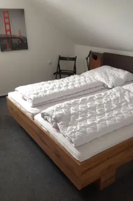 Ein Bett oder Betten in einem Zimmer der Unterkunft Apartment Hampton by Interhome