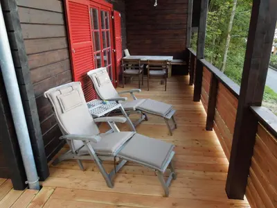 Ein Balkon oder eine Terrasse in der Unterkunft Holiday Home Blockhaus Bodefall by Interhome
