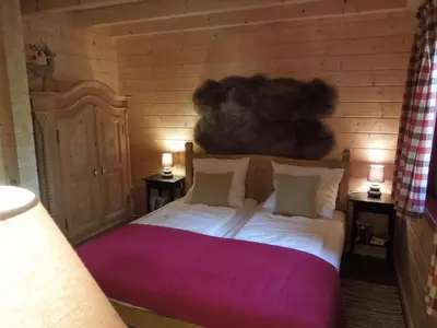 Ein Bett oder Betten in einem Zimmer der Unterkunft Holiday Home Blockhaus Bodefall by Interhome