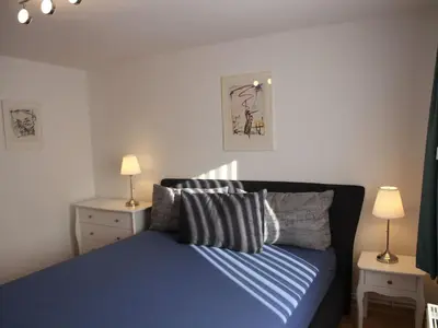 Ein Bett oder Betten in einem Zimmer der Unterkunft Apartment Wohnung Julius 7 - gemütlich und kinderfreundlich by Interhome