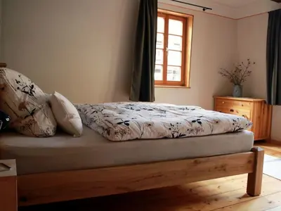 Ein Bett oder Betten in einem Zimmer der Unterkunft Holiday Home für 2 Personen - 2 Kinder ca- 70 m² in Quedlinburg- Harz - Unterharz by Interhome