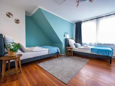 Ein Bett oder Betten in einem Zimmer der Unterkunft Apartment Stadtblick by Interhome