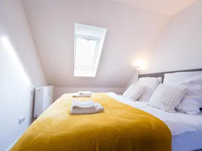 Ein Bett oder Betten in einem Zimmer der Unterkunft Apartment Stadtblick by Interhome