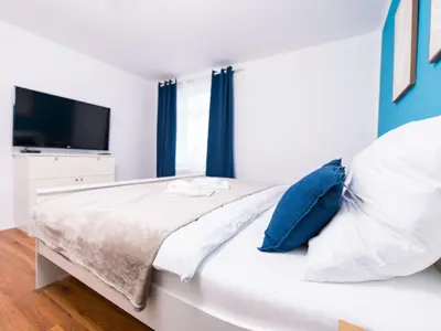 Ein Bett oder Betten in einem Zimmer der Unterkunft Apartment Stadtblick by Interhome
