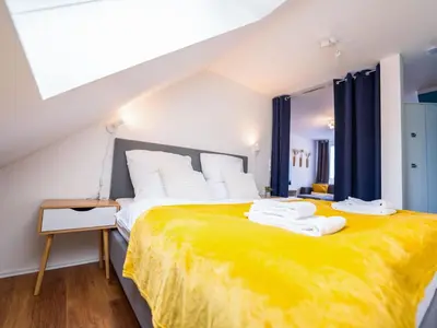 Ein Bett oder Betten in einem Zimmer der Unterkunft Apartment Stadtblick by Interhome