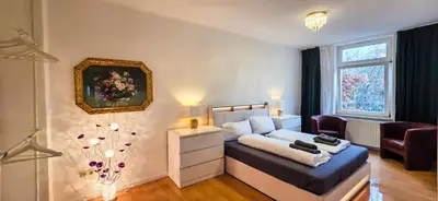 Ein Bett oder Betten in einem Zimmer der Unterkunft Großzügiges City-Apartment für 8 Gäste mit Parkplatz im Zentrum Wernigerode