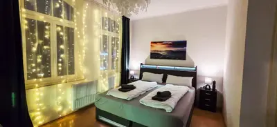 Ein Bett oder Betten in einem Zimmer der Unterkunft Großzügiges City-Apartment für 8 Gäste mit Parkplatz im Zentrum Wernigerode