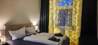 Ein Bett oder Betten in einem Zimmer der Unterkunft Großzügiges City-Apartment für 8 Gäste mit Parkplatz im Zentrum Wernigerode