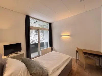Ein Bett oder Betten in einem Zimmer der Unterkunft Kurhaus im Harz - Bad Harzburg