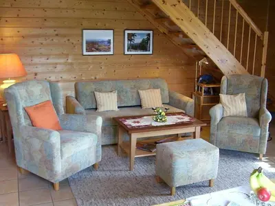 Ein Sitzbereich in der Unterkunft Gemütliches Ferienhaus mit Terrasse - Ferienhäuser Auerhahn