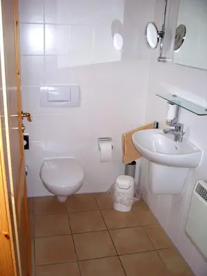Ein Badezimmer in der Unterkunft Gemütliches Ferienhaus mit Terrasse - Ferienhäuser Auerhahn