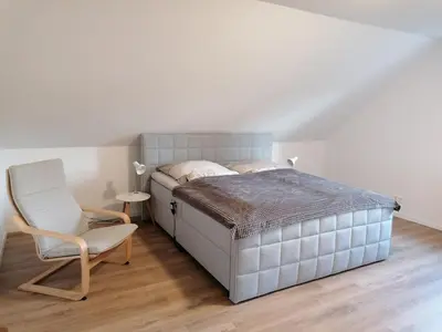 Ein Bett oder Betten in einem Zimmer der Unterkunft Ferienwohnung HarzErlebnis