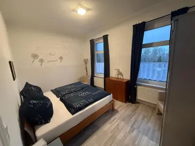 Ein Bett oder Betten in einem Zimmer der Unterkunft Ferienwohnung Margrit