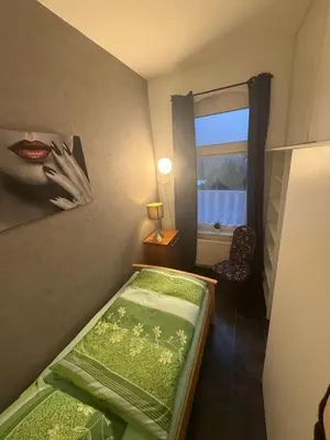 Ein Bett oder Betten in einem Zimmer der Unterkunft Ferienwohnung Margrit