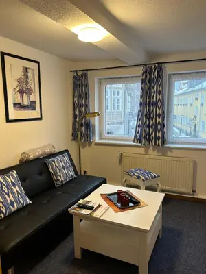 Ein Sitzbereich in der Unterkunft Ferienwohnung Harzlicht