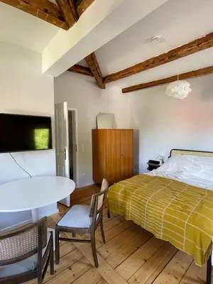 Ein Bett oder Betten in einem Zimmer der Unterkunft Süße Wohnung in Gründerzeitvilla