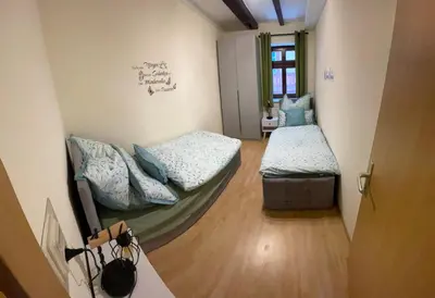 Ein Bett oder Betten in einem Zimmer der Unterkunft Ferienwohnung Osterwieck Mittelstraße 4