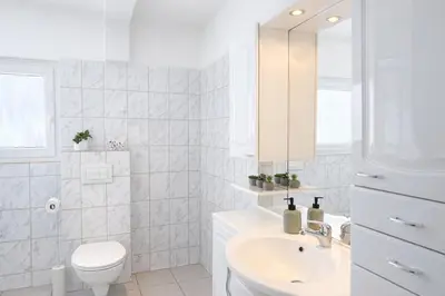 Ein Badezimmer in der Unterkunft PrimeLoft 
