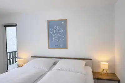 Ein Bett oder Betten in einem Zimmer der Unterkunft PrimeLoft 