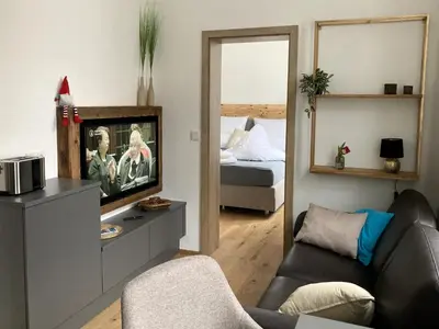 Ein Bett oder Betten in einem Zimmer der Unterkunft Villa Schlossblick III - Zeit zum Träumen in exklusiver Suite 