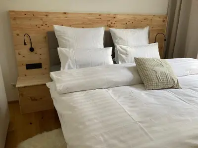 Ein Bett oder Betten in einem Zimmer der Unterkunft Villa Schlossblick III - Zeit zum Träumen in exklusiver Suite 