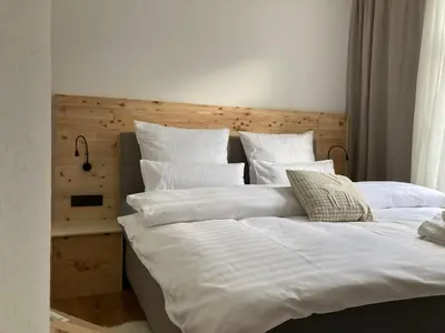 Ein Bett oder Betten in einem Zimmer der Unterkunft Villa Schlossblick III - Zeit zum Träumen in exklusiver Suite 