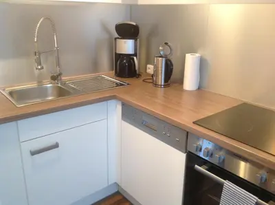 Küche/Küchenzeile in der Unterkunft Ferienwohnung Hampton