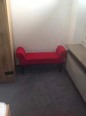 Ein Sitzbereich in der Unterkunft Ferienwohnung Hampton