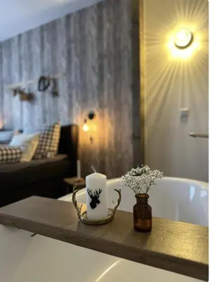 Ein Sitzbereich in der Unterkunft Cozy Chalet