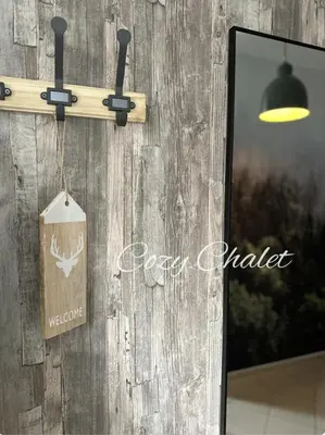 Ein Zertifikat, Auszeichnung, Logo oder anderes Dokument, das in der Unterkunft Cozy Chalet ausgestellt ist