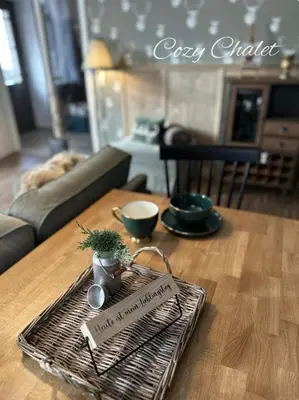 Ein Sitzbereich in der Unterkunft Cozy Chalet