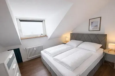 Ein Bett oder Betten in einem Zimmer der Unterkunft PrimeLoft 