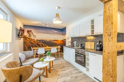 Küche/Küchenzeile in der Unterkunft home4stays Apartmenthaus in Top-Lage an der Wurmbergseilbahn