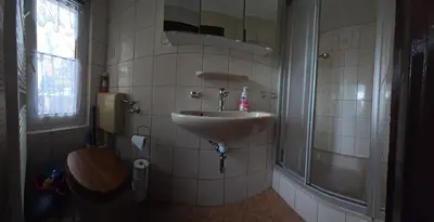 Ein Badezimmer in der Unterkunft FeWo mit Brockenblick