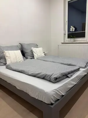Ein Bett oder Betten in einem Zimmer der Unterkunft FeWo Harz-Glück