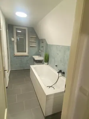 Ein Badezimmer in der Unterkunft Wunderschönes Haus am Waldrand 1