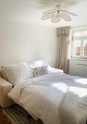 Ein Bett oder Betten in einem Zimmer der Unterkunft Hyggeleben, Innenstadt, Schlossblick, Parkplatz