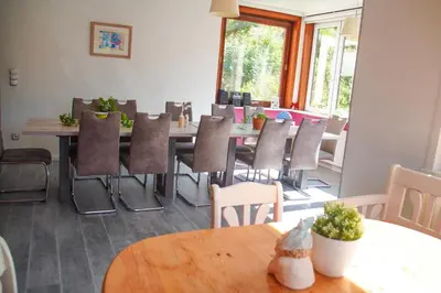 Ein Sitzbereich in der Unterkunft Ferienhaus am Lampersberg