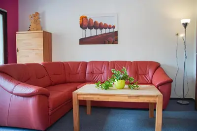Ein Sitzbereich in der Unterkunft Ferienhaus am Lampersberg