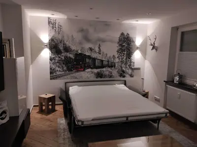 Ein Bett oder Betten in einem Zimmer der Unterkunft Ferienwohnung Harzoase
