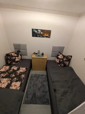 Ein Bett oder Betten in einem Zimmer der Unterkunft Bocksbergbande