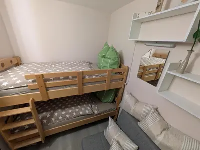 Ein Bett oder Betten in einem Zimmer der Unterkunft Bocksbergbande