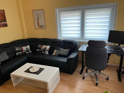 Ein Sitzbereich in der Unterkunft Bodetalapartment Thale