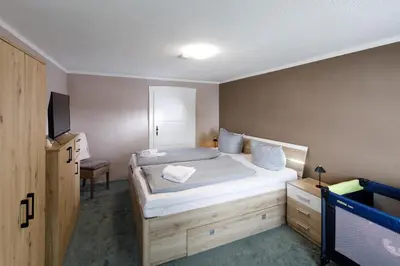 Ein Bett oder Betten in einem Zimmer der Unterkunft Lota's Tanne