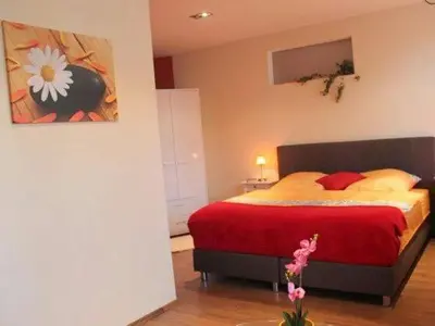 Ein Bett oder Betten in einem Zimmer der Unterkunft XXL City-Appartement Wernigerode